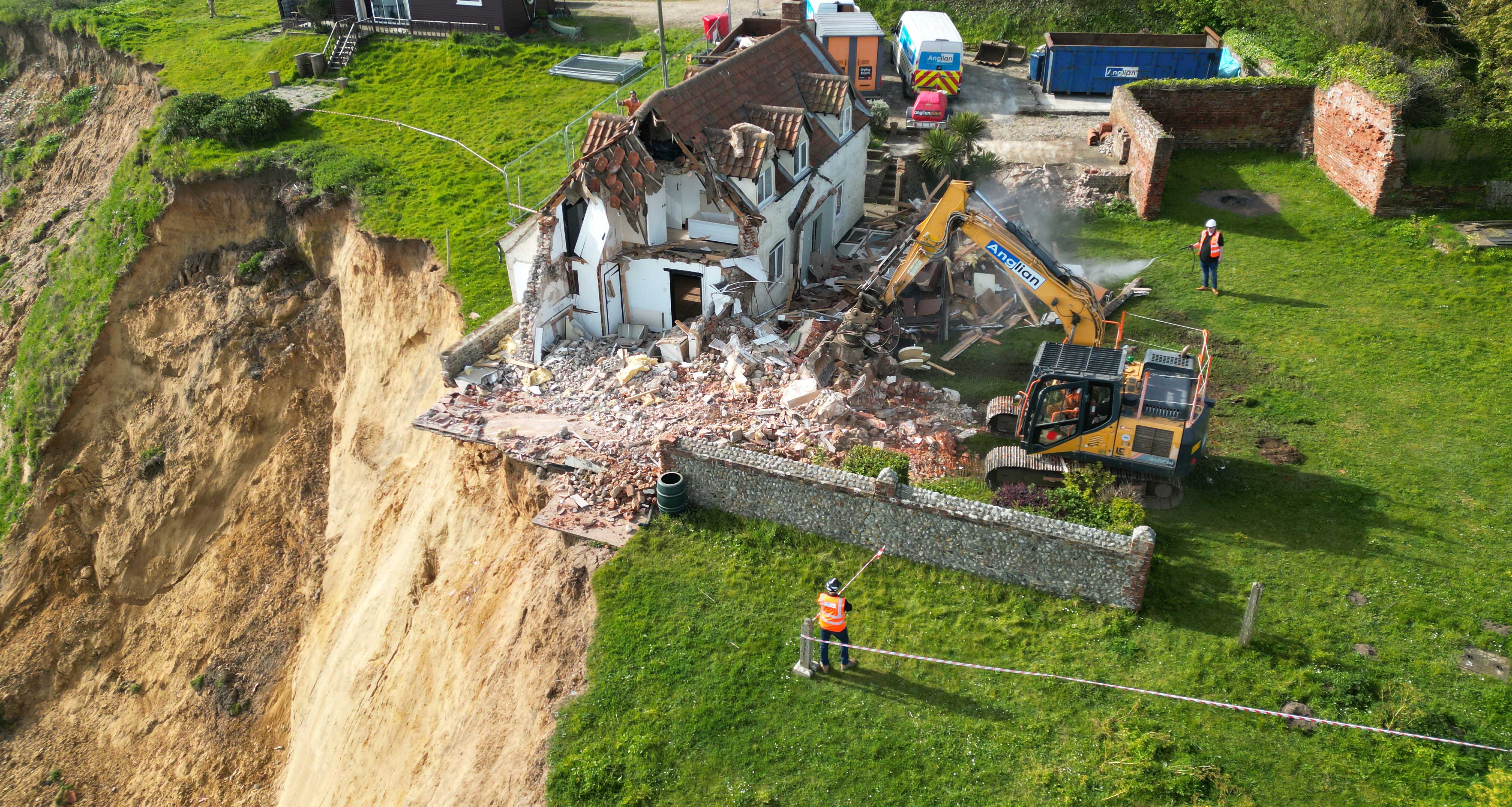 demolition of a property in Trimingham